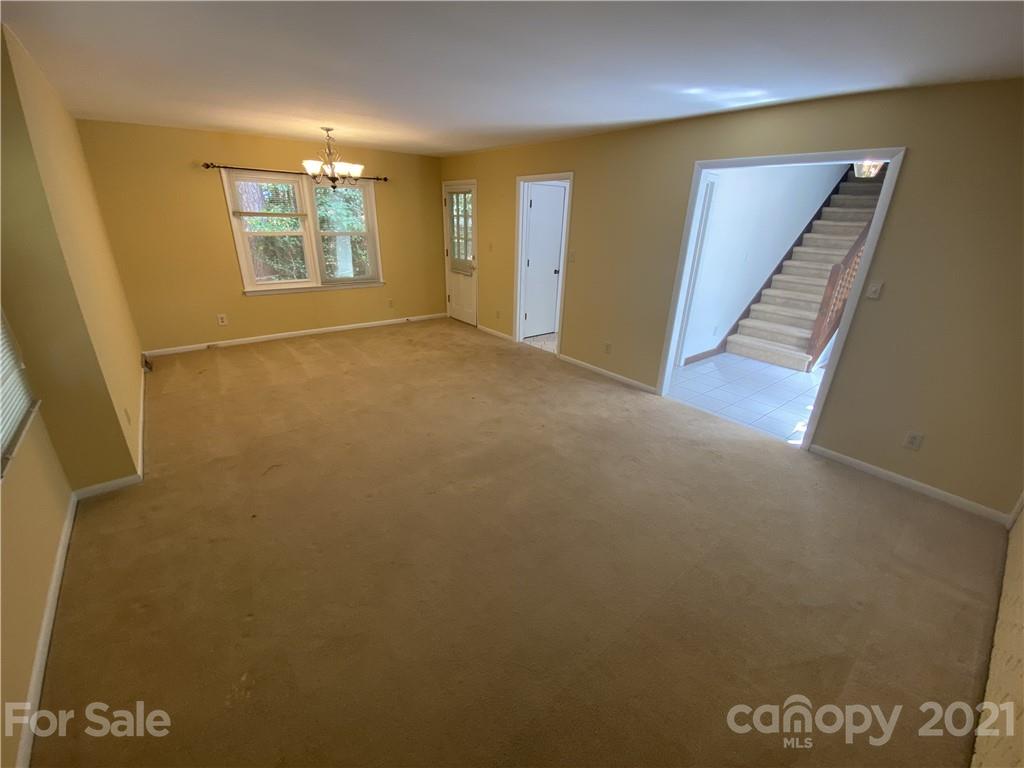 6205 Coldwater Court Raleigh, NC 27612 - Photo 5 of 16 a view of an empty room with a window