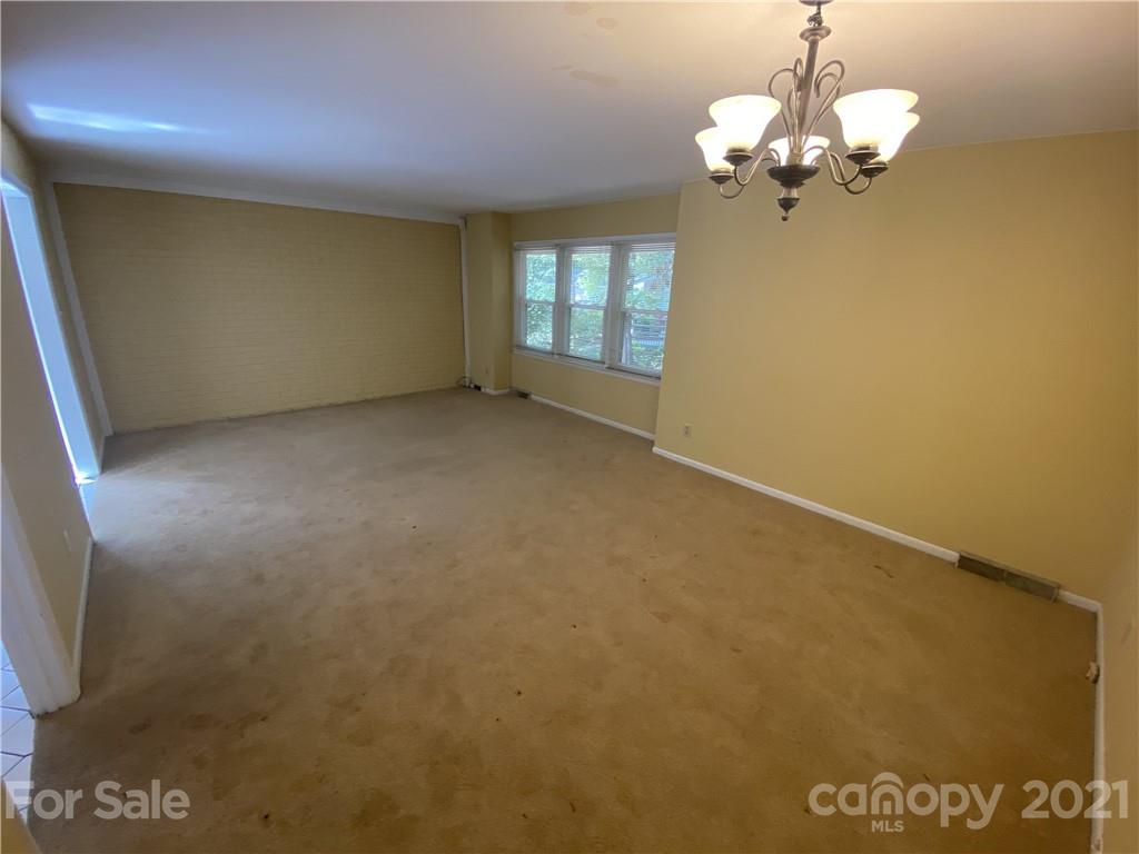 6205 Coldwater Court Raleigh, NC 27612 - Photo 6 of 16 a view of livingroom with window