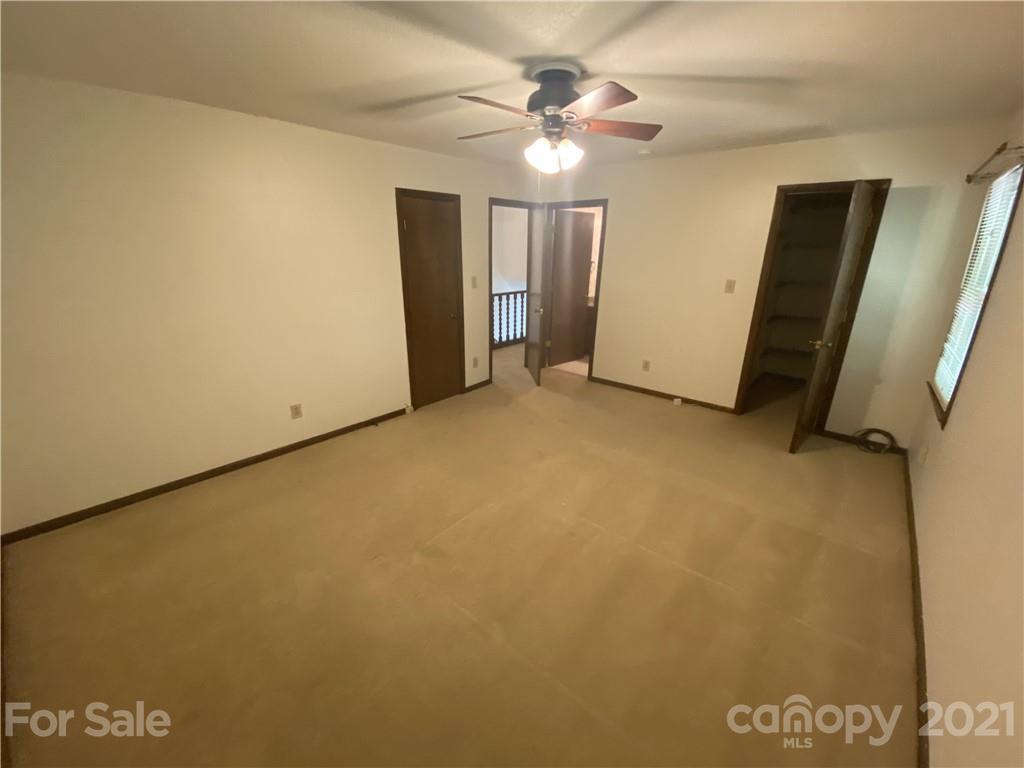 6205 Coldwater Court Raleigh, NC 27612 - Photo 7 of 16 a view of an empty room with a window