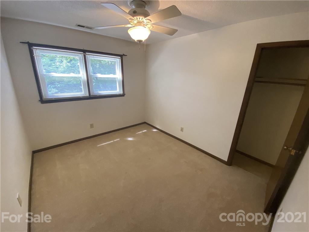 6205 Coldwater Court Raleigh, NC 27612 - Photo 10 of 16 a view of an empty room with a window