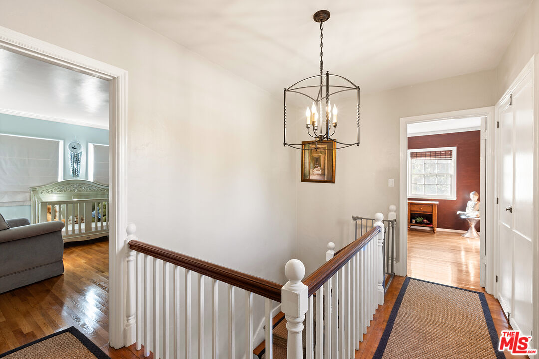 2186 San Pasqual Street Pasadena, CA 91107 - Photo 11 of 29 a view of a livingroom with furniture bedroom and wooden floor