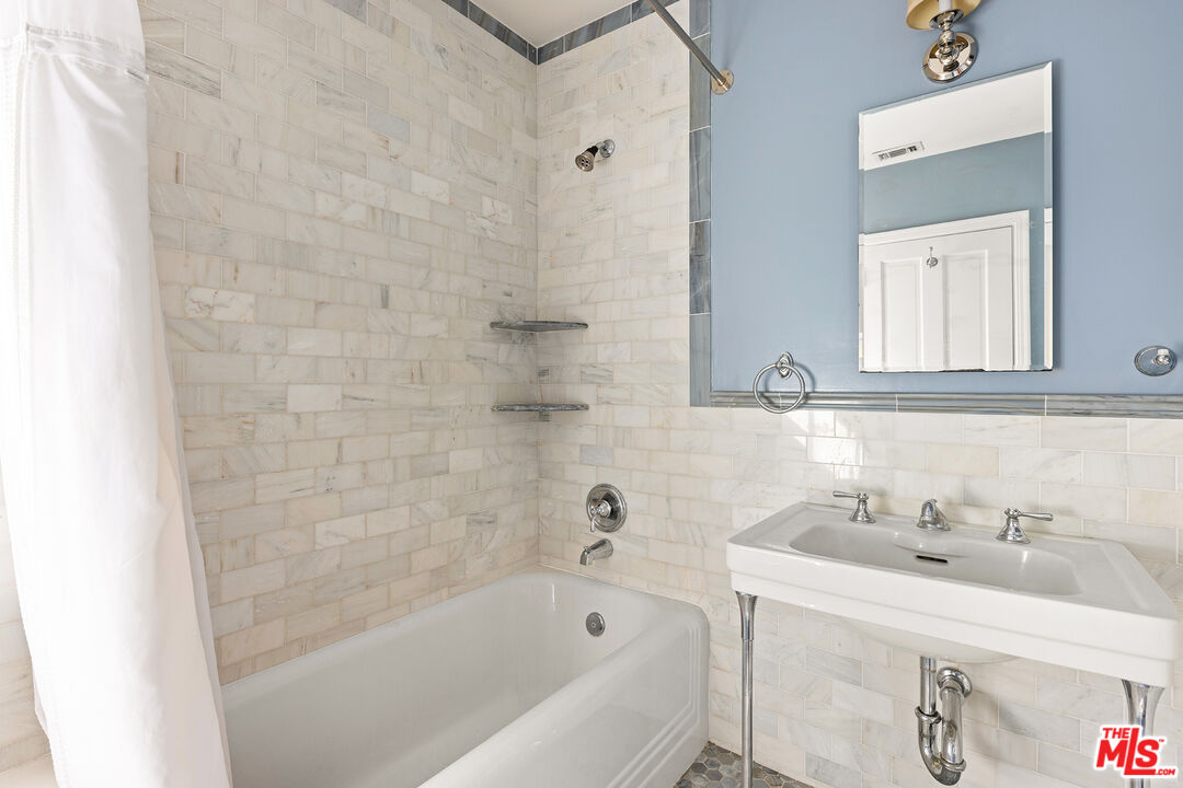 2186 San Pasqual Street Pasadena, CA 91107 - Photo 14 of 29 a white bath tub sitting next to a white sink