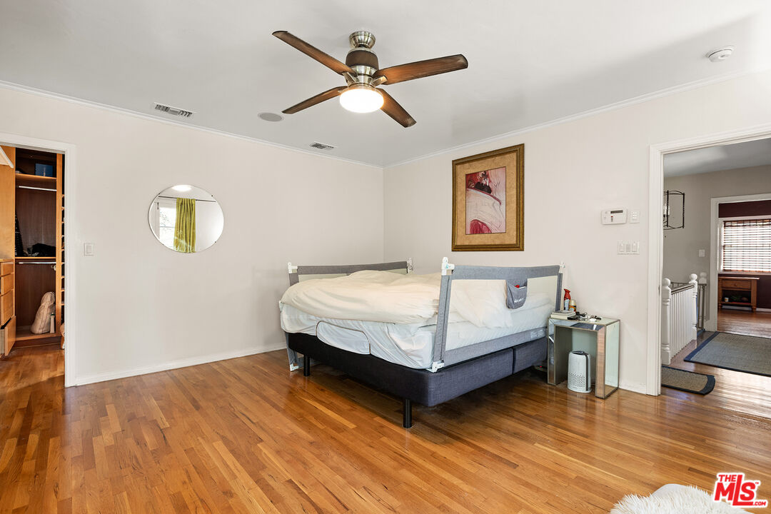 2186 San Pasqual Street Pasadena, CA 91107 - Photo 15 of 29 a bedroom with a bed and wooden floor