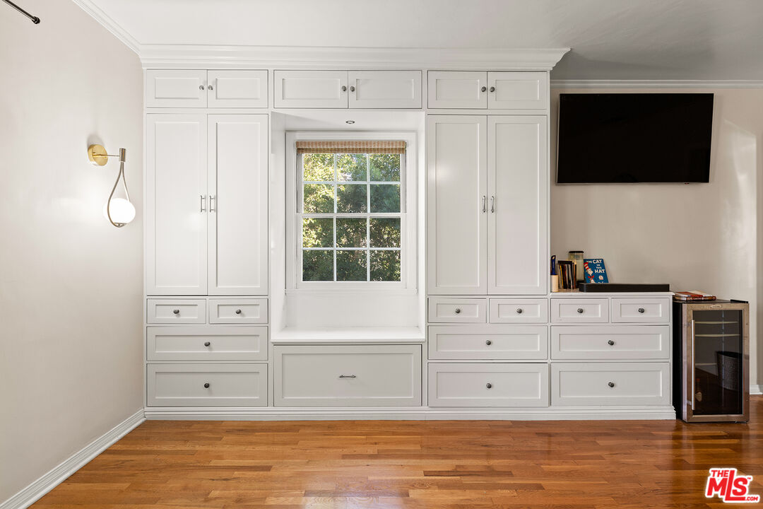 2186 San Pasqual Street Pasadena, CA 91107 - Photo 17 of 29 a view of an empty room with wooden floor and cabinet