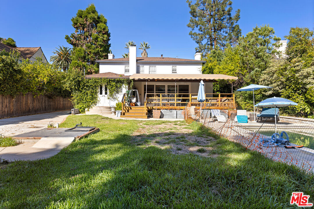2186 San Pasqual Street Pasadena, CA 91107 - Photo 24 of 29 a view of a house with a swimming pool