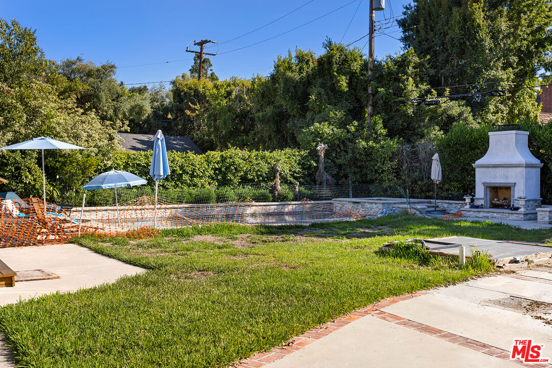 2186 San Pasqual Street Pasadena, CA 91107 - Photo 26 of 29 a view of a swimming pool with a patio