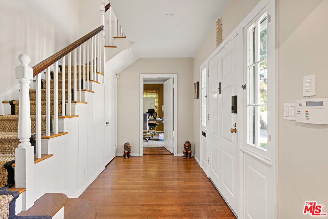 2186 San Pasqual Street Pasadena, CA 91107 - Photo 3 of 29 a view of a hallway with wooden floor and staircase