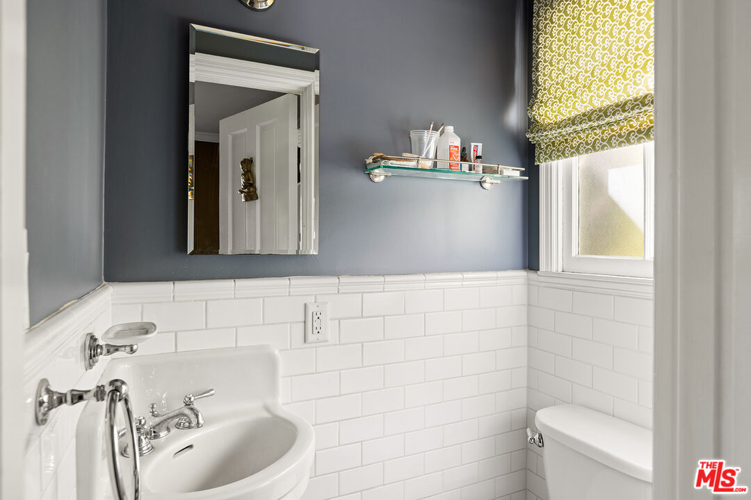 2186 San Pasqual Street Pasadena, CA 91107 - Photo 10 of 29 a bathroom with a sink a toilet and shower