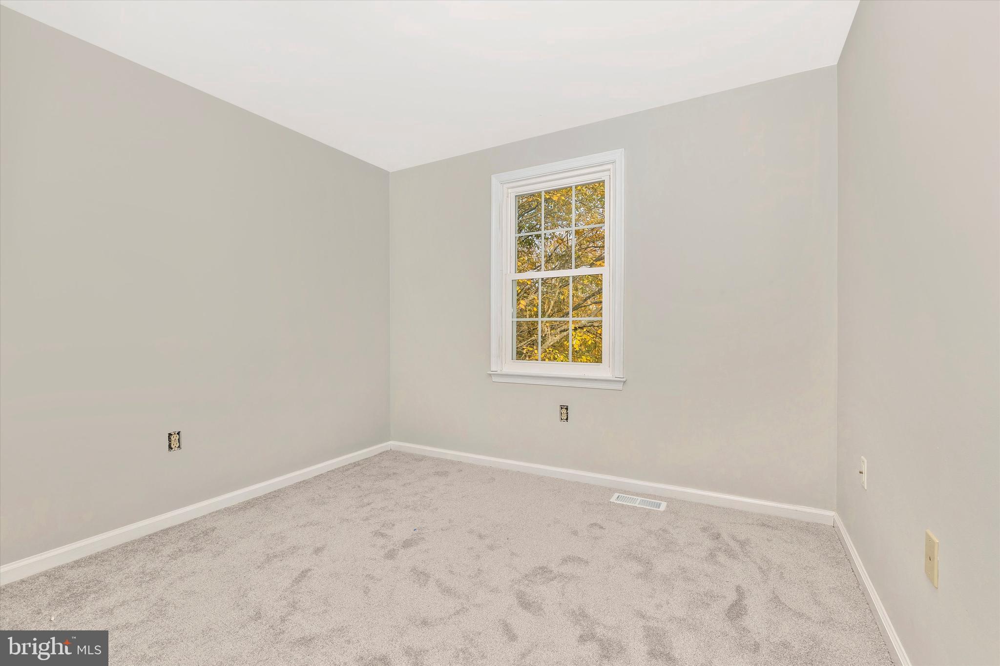 8001 Hollow Reed Court Frederick, MD 21701 - Photo 27 of 33 an empty room with a window