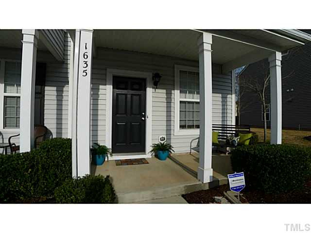 a black and white photo of a house