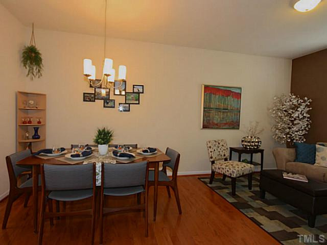 1635 Snow Mass Way Durham, NC 27713 - Photo 16 of 25 a view of a dining room with furniture