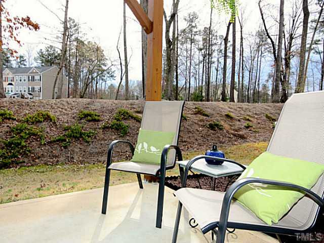 1635 Snow Mass Way Durham, NC 27713 - Photo 19 of 25 a view of a chairs and table in backyard