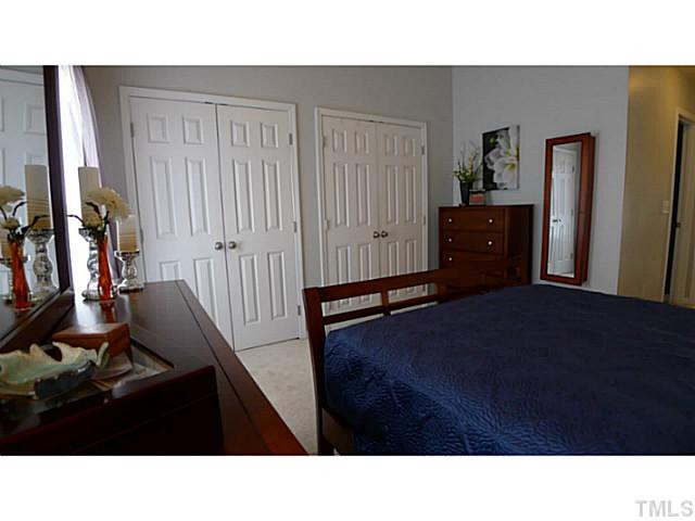 1635 Snow Mass Way Durham, NC 27713 - Photo 20 of 25 a black and white room with wooden floor