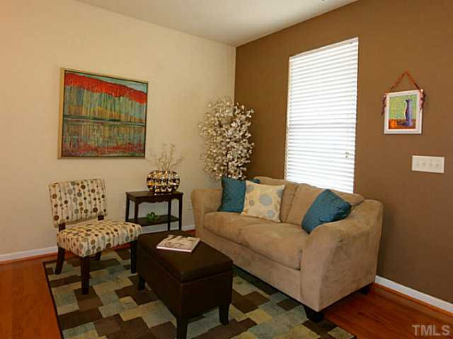 1635 Snow Mass Way Durham, NC 27713 - Photo 8 of 25 a living room with furniture and a window