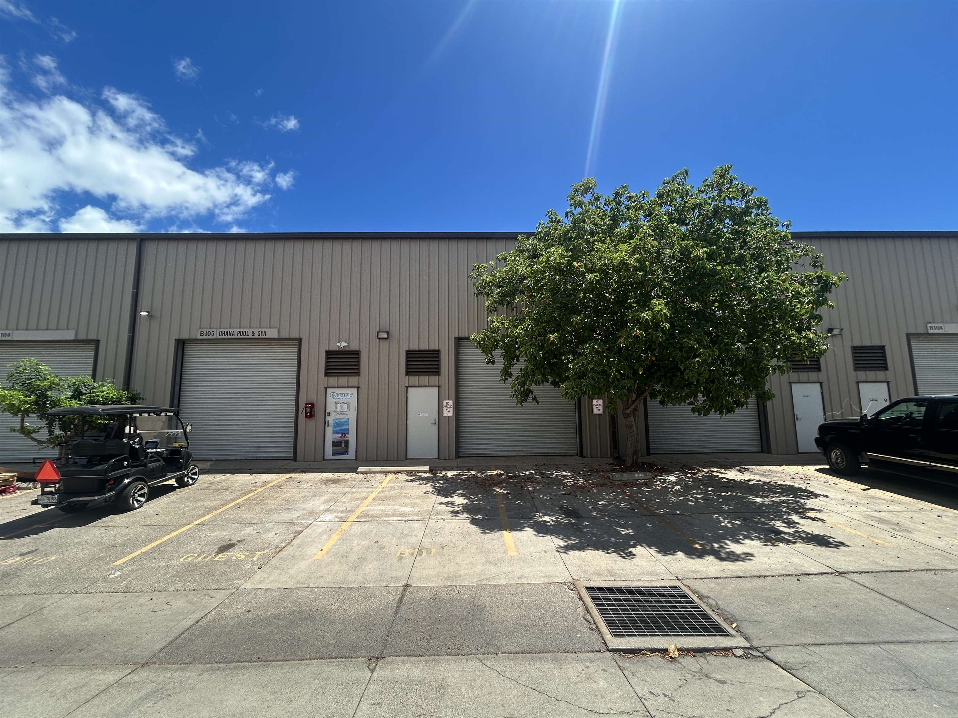 178 Kupuohi Street, Unit B106 Lahaina, HI 96761 - Photo 1 of 9 a front view of a house with a yard