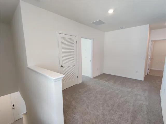an empty room with an entryway