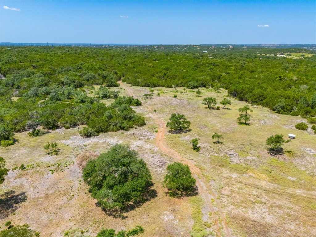 Ranch #6 Ranch Road Austin, TX 78737 - Photo 13 of 32 a view of a lake with beach and outdoor space
