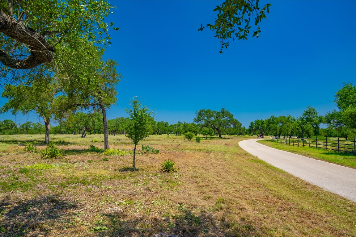 Ranch #6 Ranch Road Austin, TX 78737 - Photo 7 of 32 a view of a yard with swimming pool