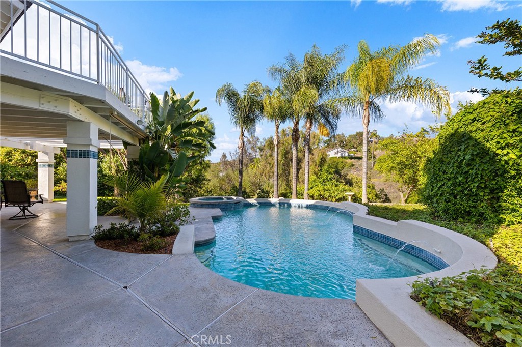16562 Orangewind Lane Riverside, CA 92503 - Photo 19 of 45 Back yard view of pool & spa and upper master balcony