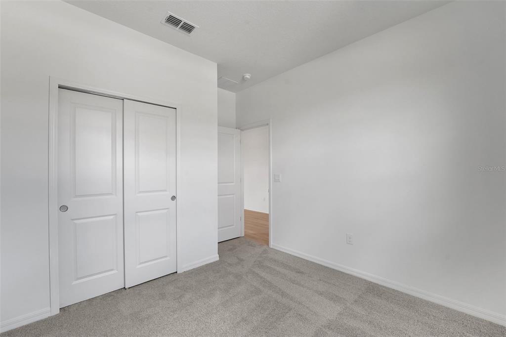 35424 Tuscan Hill Road Dade City, FL 33525 - Photo 12 of 42 a view of an empty room