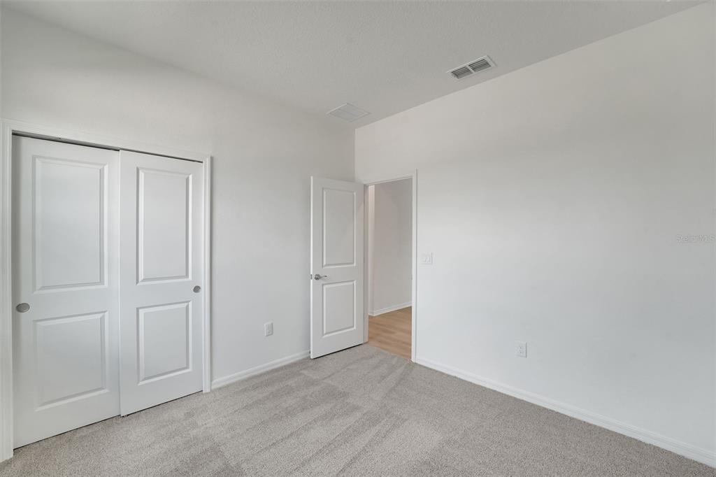 35424 Tuscan Hill Road Dade City, FL 33525 - Photo 26 of 42 a view of an empty room