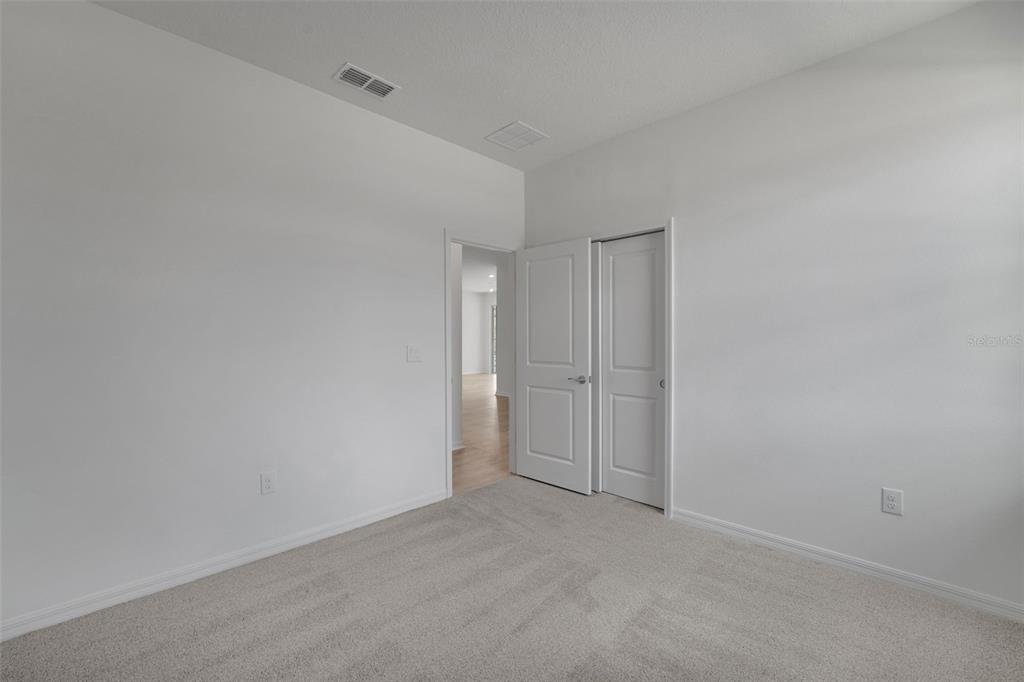 35424 Tuscan Hill Road Dade City, FL 33525 - Photo 28 of 42 a view of an empty room