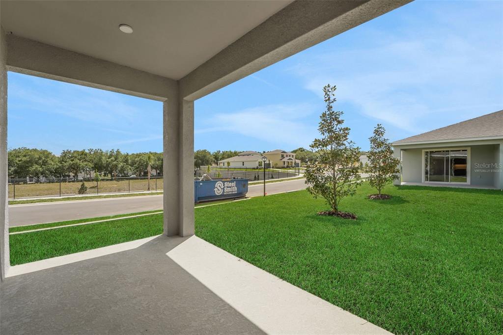 35424 Tuscan Hill Road Dade City, FL 33525 - Photo 38 of 42 a porch with a yard