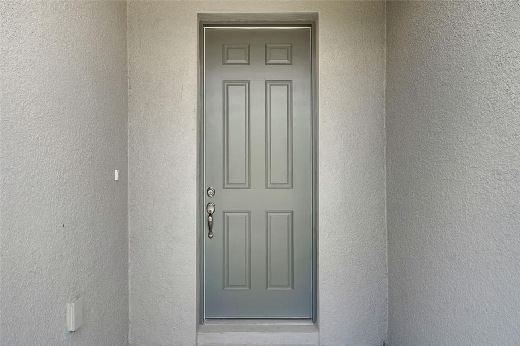 35424 Tuscan Hill Road Dade City, FL 33525 - Photo 8 of 42 a view of a wooden door