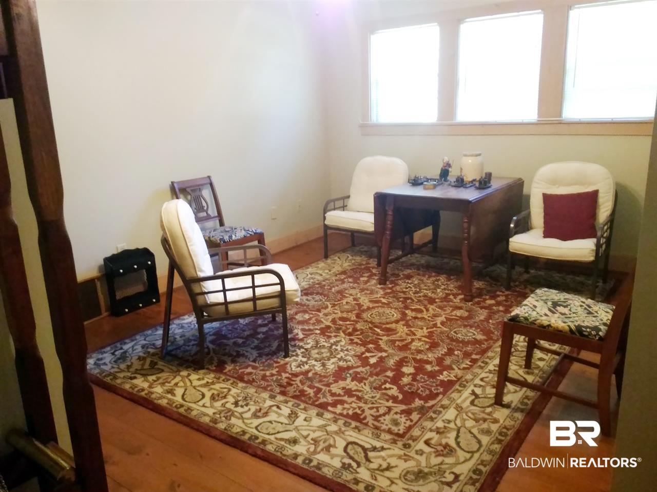 8189 River Road North Foley, AL 36535 - Photo 27 of 50 This can become a third bedroom suite.