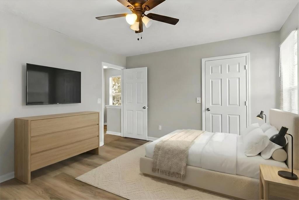 3483 Kingswood Run Decatur, GA 30034 - Photo 12 of 19 a bedroom with a bed and a flat screen tv