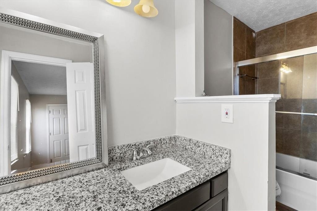 3483 Kingswood Run Decatur, GA 30034 - Photo 13 of 19 a bathroom with a sink and a mirror