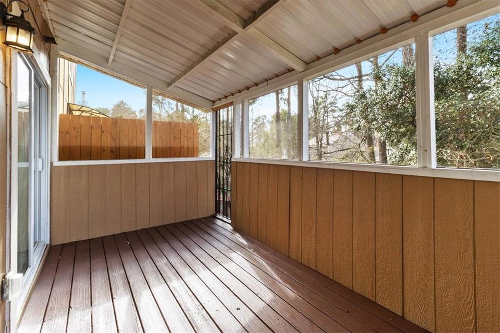 3483 Kingswood Run Decatur, GA 30034 - Photo 17 of 19 a view of a room with wooden floor and iron stairs