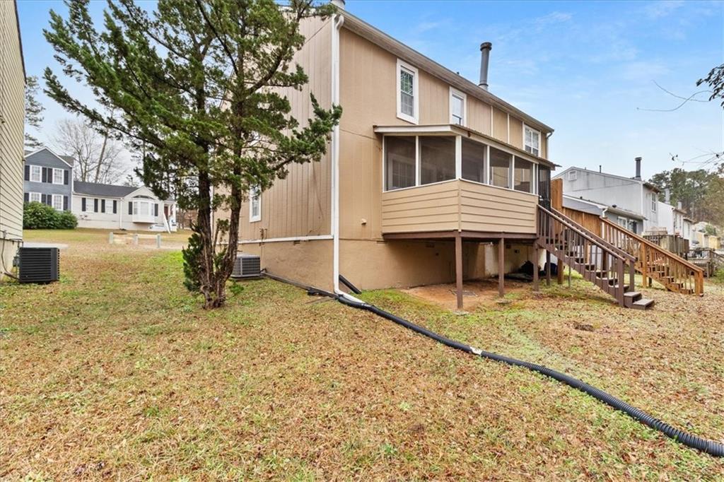 3483 Kingswood Run Decatur, GA 30034 - Photo 18 of 19 a front view of a house with a yard