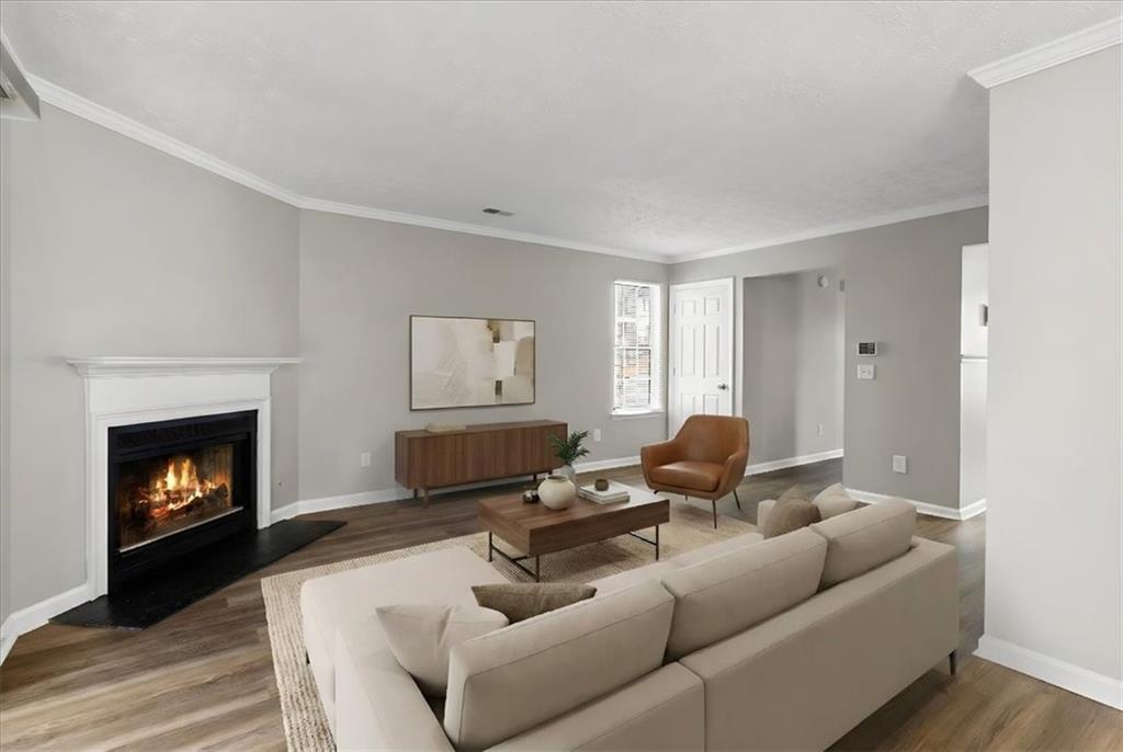 3483 Kingswood Run Decatur, GA 30034 - Photo 6 of 19 a living room with furniture and a fireplace