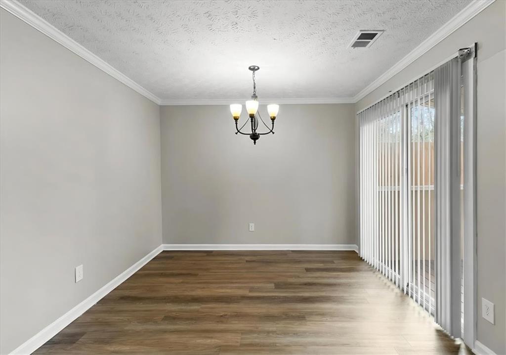 3483 Kingswood Run Decatur, GA 30034 - Photo 9 of 19 a view of empty room with wooden floor and fan