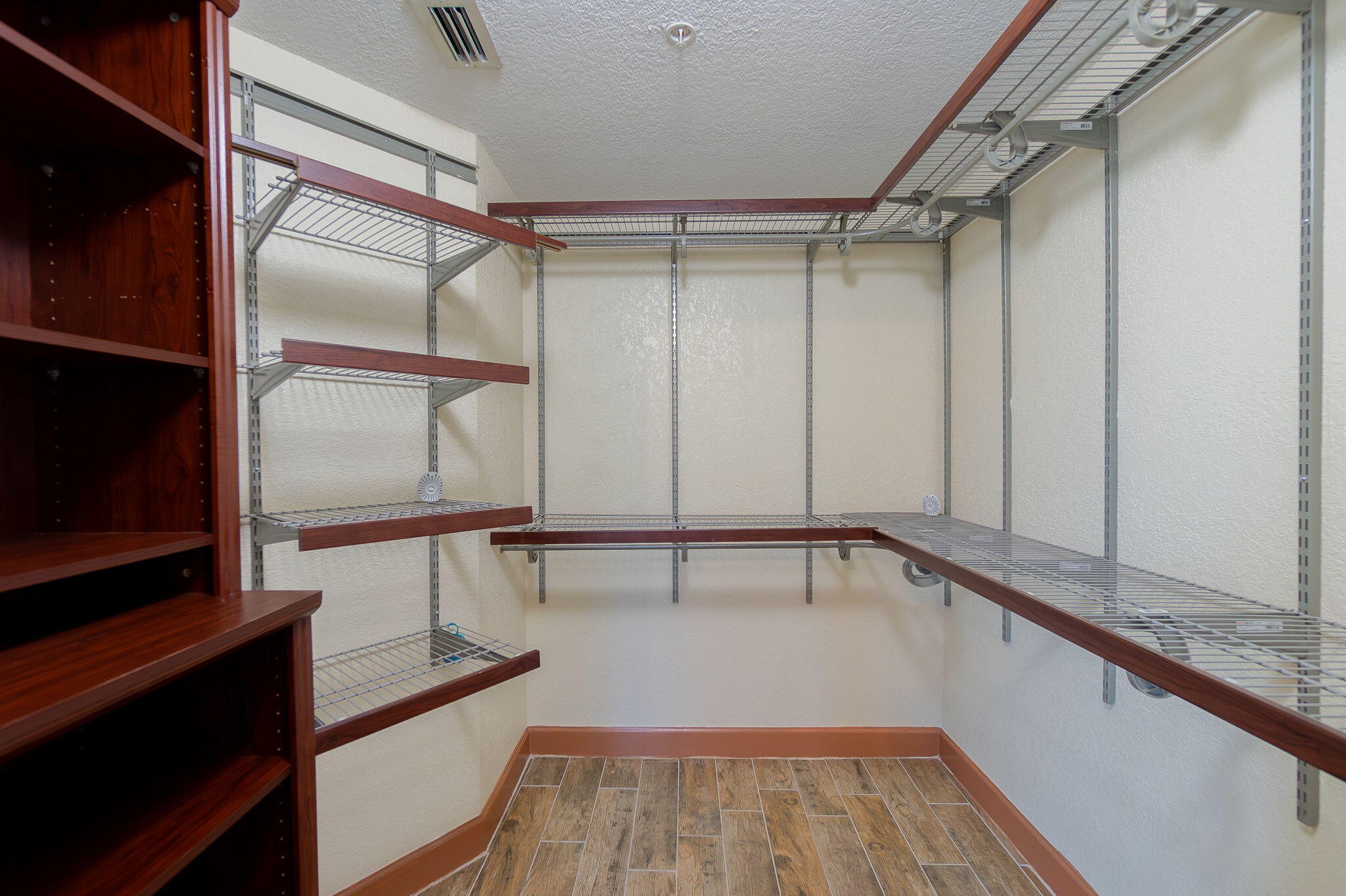 1690 Renaissance Commons Boulevard, Unit 1201 Boynton Beach, FL 33426 - Photo 13 of 30 Spacious customized walking-in closet