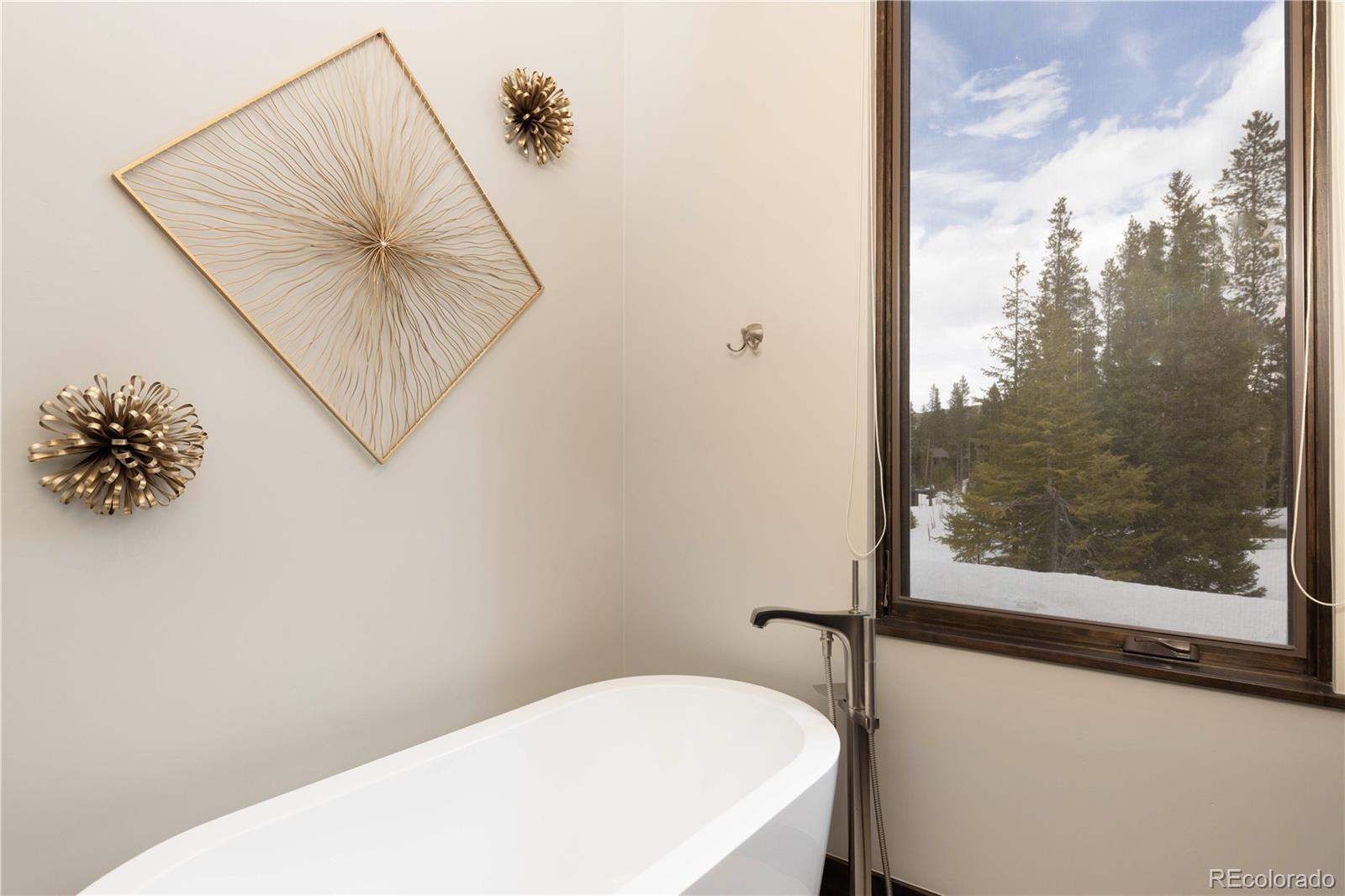92 Cucumber Creek Road Breckenridge, CO 80424 - Photo 19 of 37 a bathroom with a toilet and a shower