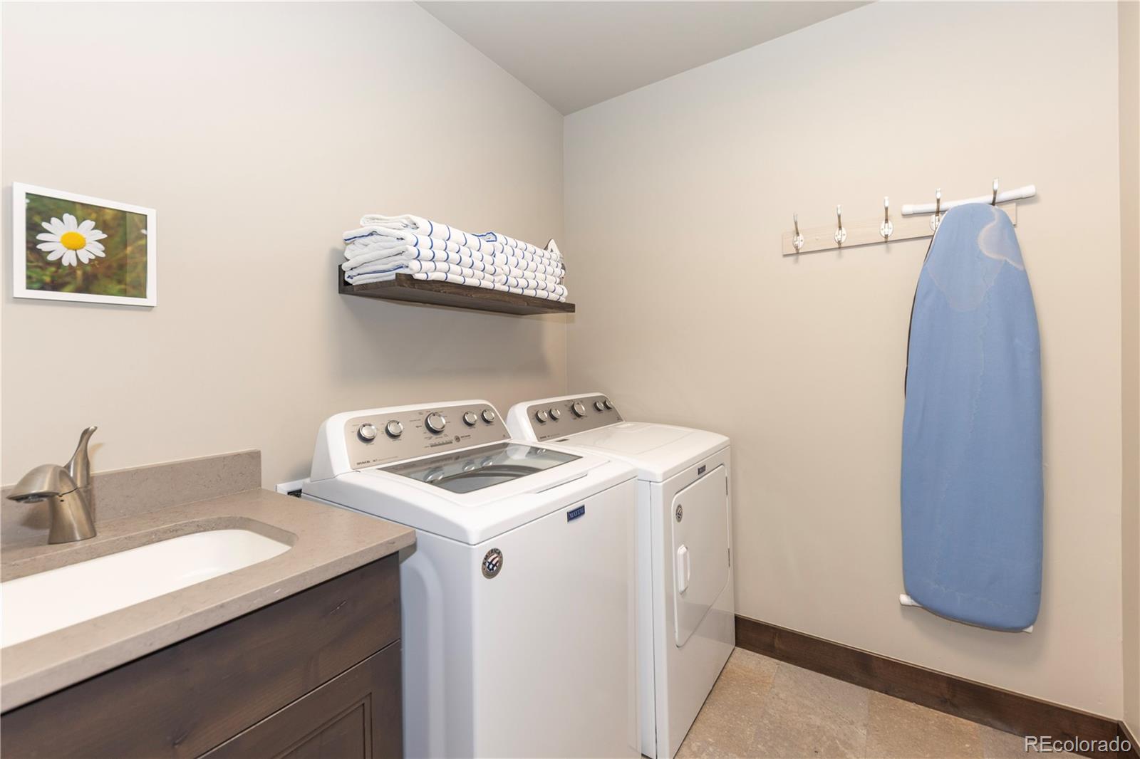 92 Cucumber Creek Road Breckenridge, CO 80424 - Photo 32 of 37 a utility room with dryer and washer
