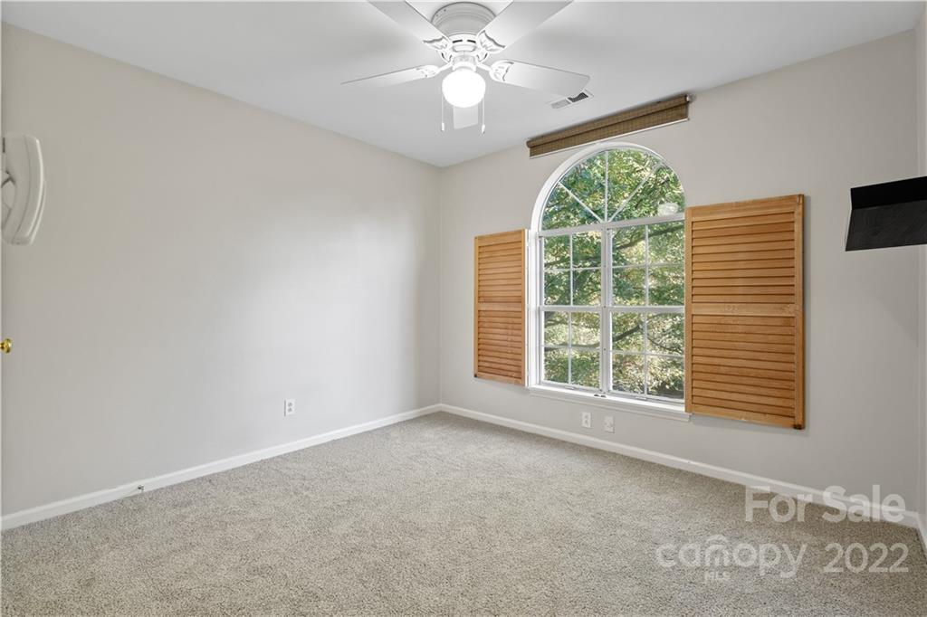 12021 Danby Road Pineville, NC 28134 - Photo 16 of 27 a view of an empty room with a window