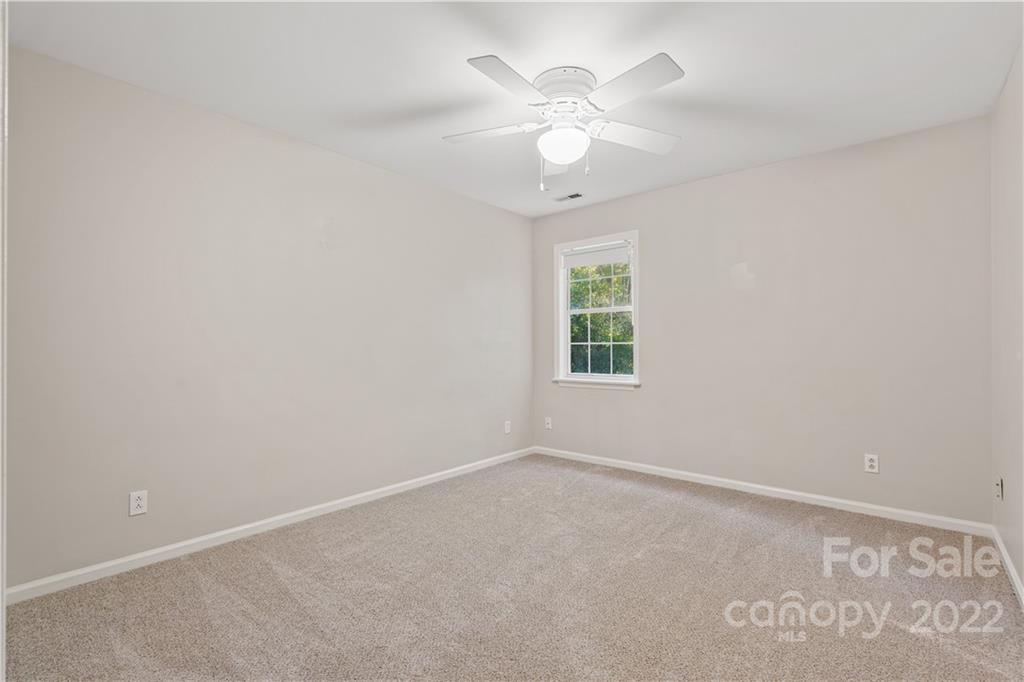 12021 Danby Road Pineville, NC 28134 - Photo 20 of 27 an empty room with a window