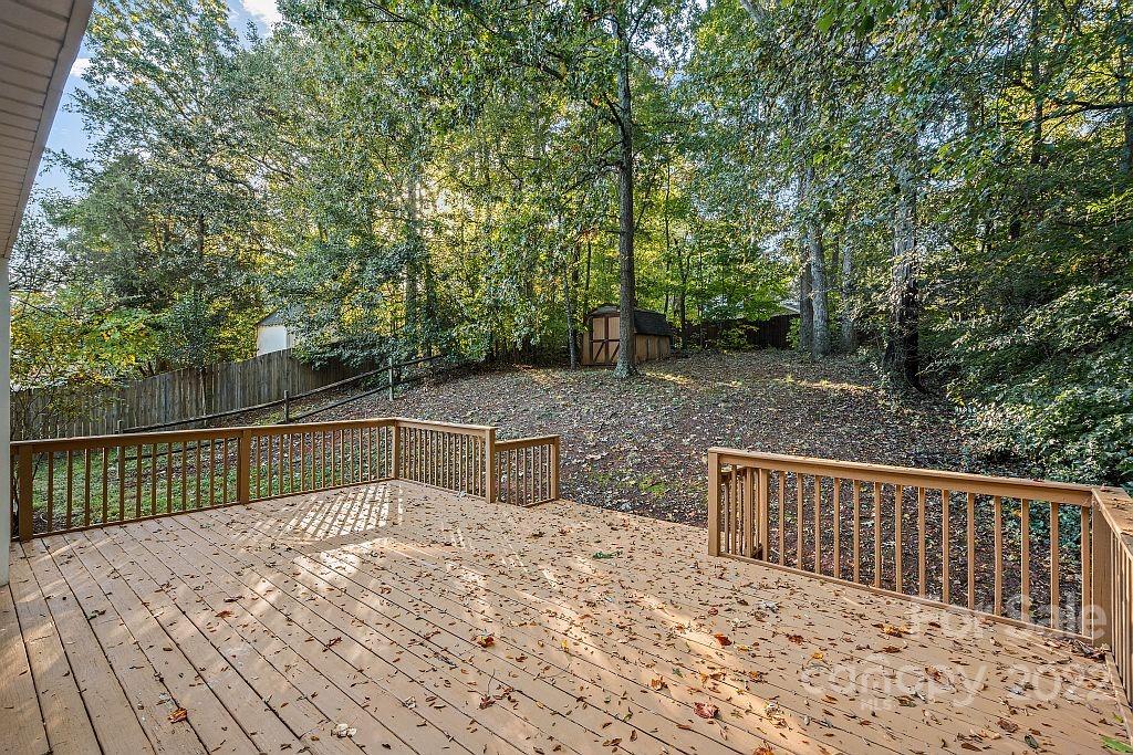 12021 Danby Road Pineville, NC 28134 - Photo 26 of 27 a view of backyard and deck