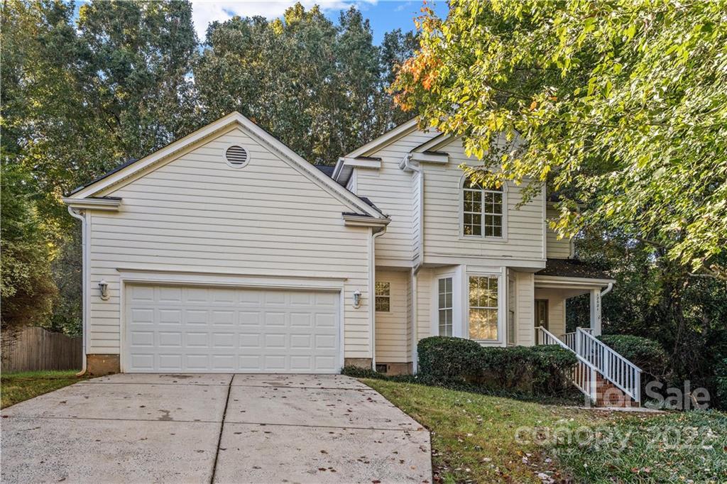 12021 Danby Road Pineville, NC 28134 - Photo 7 of 27 front view of a house and a yard