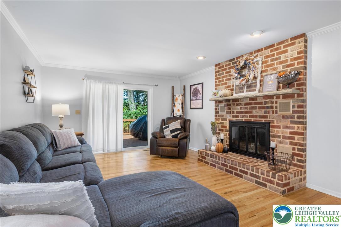569 Pine Tree Drive Nazareth, PA 18064 - Photo 8 of 29 a living room with furniture and a fireplace