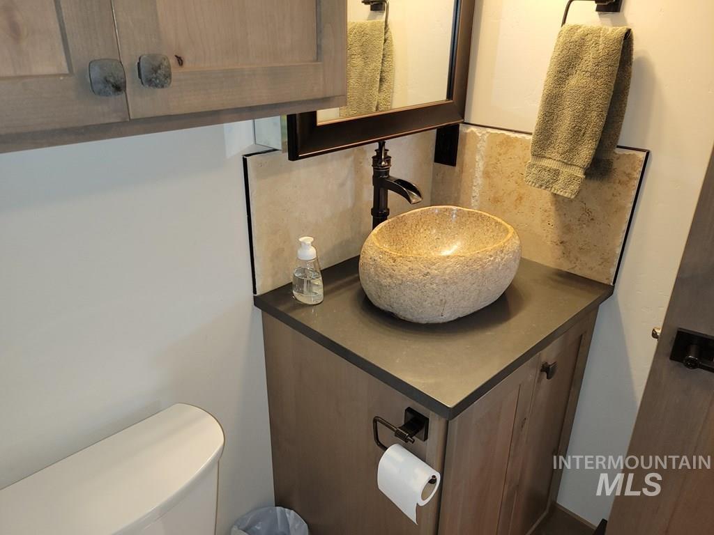 31-33 Bacon Creek Road Cascade, ID 83611 - Photo 22 of 23 Bathroom featuring vanity and toilet