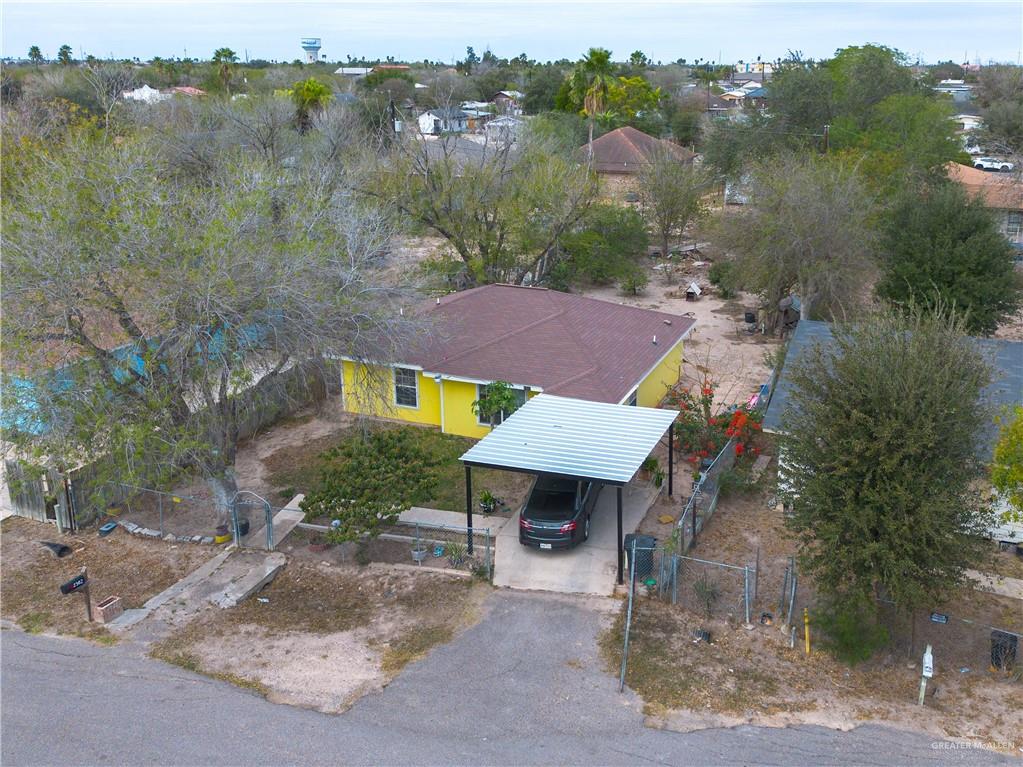 2302 Paris Street Mission, TX 78574 - Photo 23 of 25 an aerial view of a house with yard and tree in the background