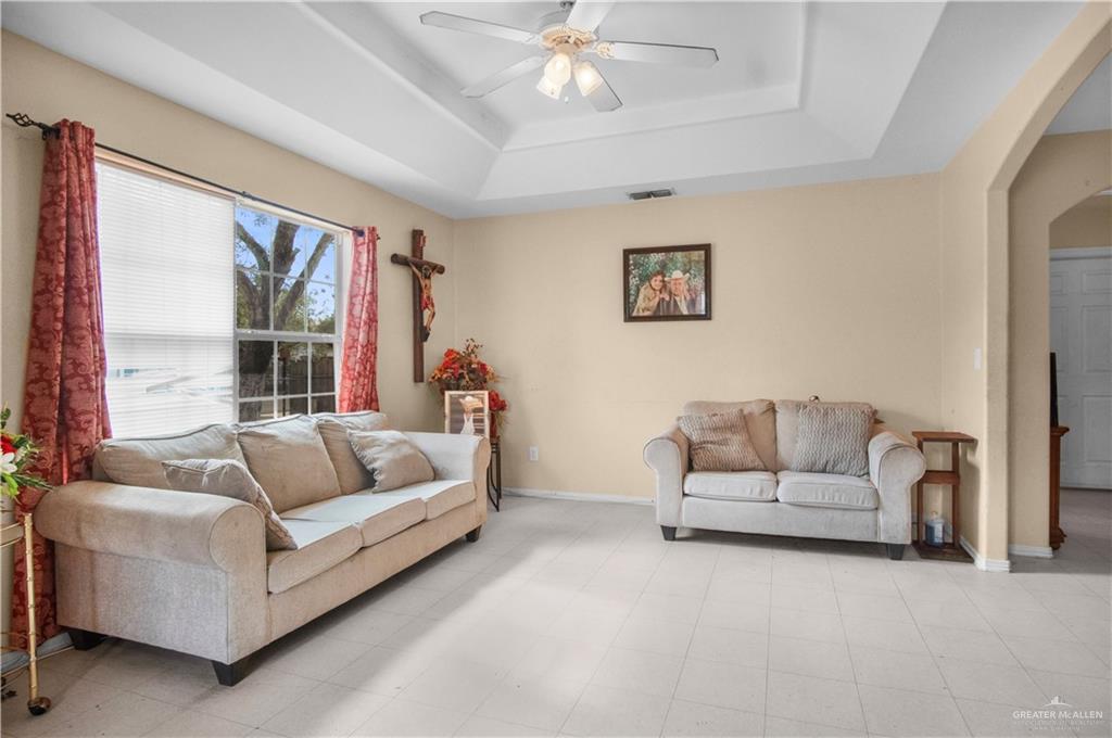 2302 Paris Street Mission, TX 78574 - Photo 4 of 25 a living room with furniture and a large window
