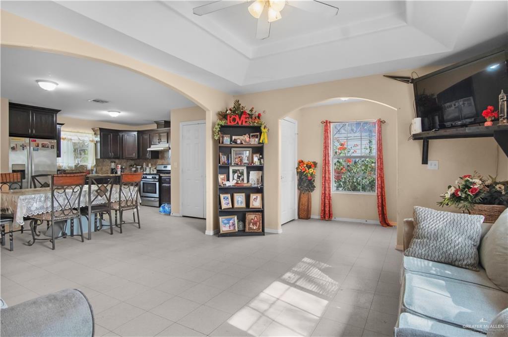 2302 Paris Street Mission, TX 78574 - Photo 6 of 25 a living room with furniture and a flat screen tv