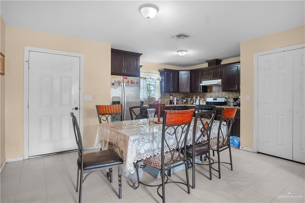 2302 Paris Street Mission, TX 78574 - Photo 10 of 25 a view of a dining room with furniture