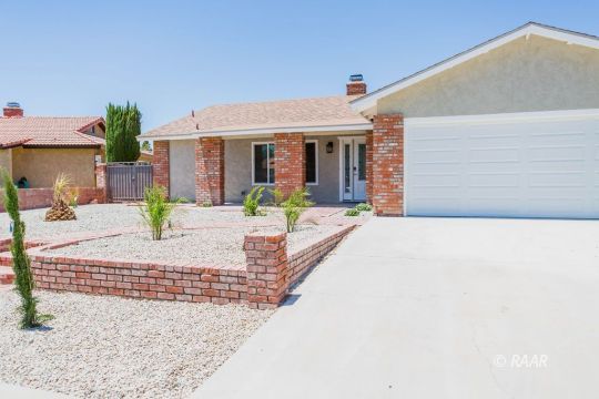 513 Suzanne Street Ridgecrest, CA 93555 - Photo 2 of 34 a view of a house with patio