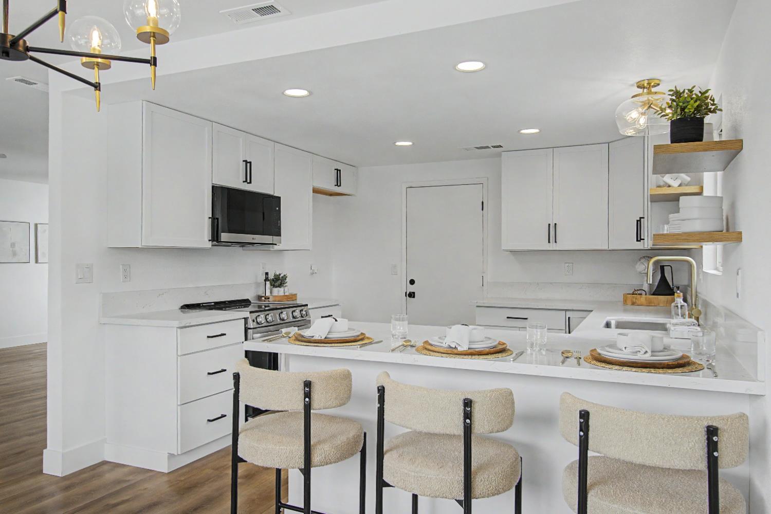 3184 Topeka Drive Merced, CA 95348 - Photo 6 of 26 Kitchen with breakfast bar